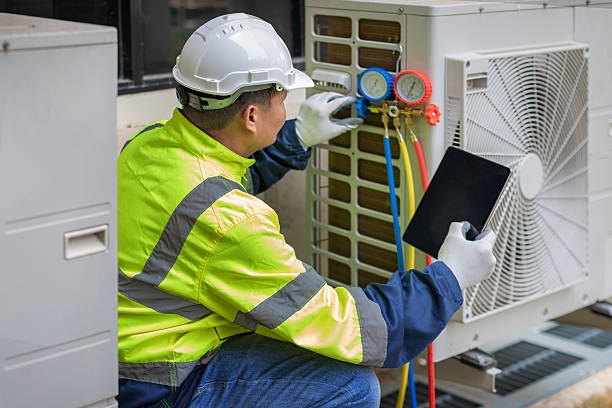 Professional Heat Pump Repair technician working in Wesley, AR